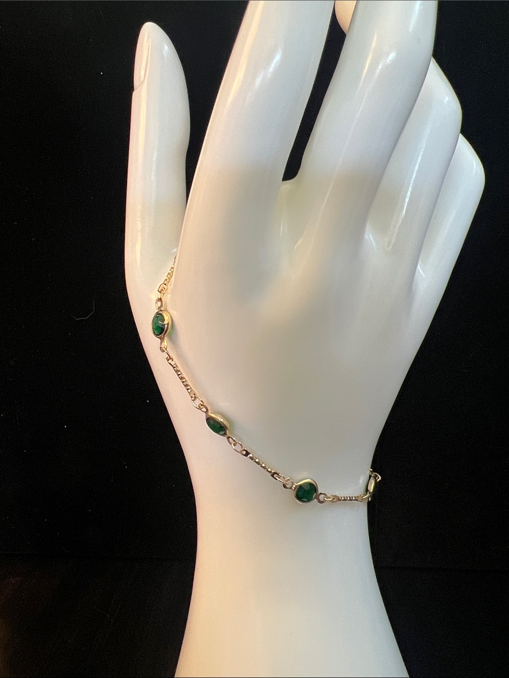 Gold-Tone Bracelet with Green Gem Accents